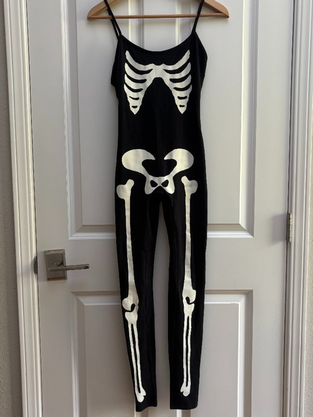 Black Glow In The Dark Halloween Skeleton Catsuit | Urban Outfitters